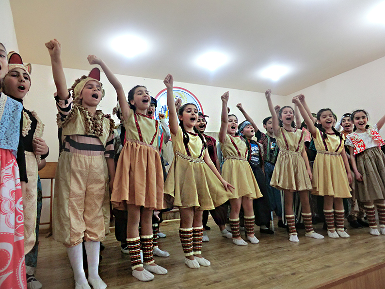 Children sing of the victory of good over evil.