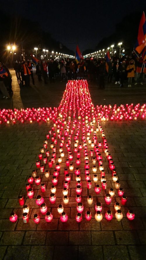 Germany ConcertThe-cross-of-votive-candles-scaled-e1605207606435